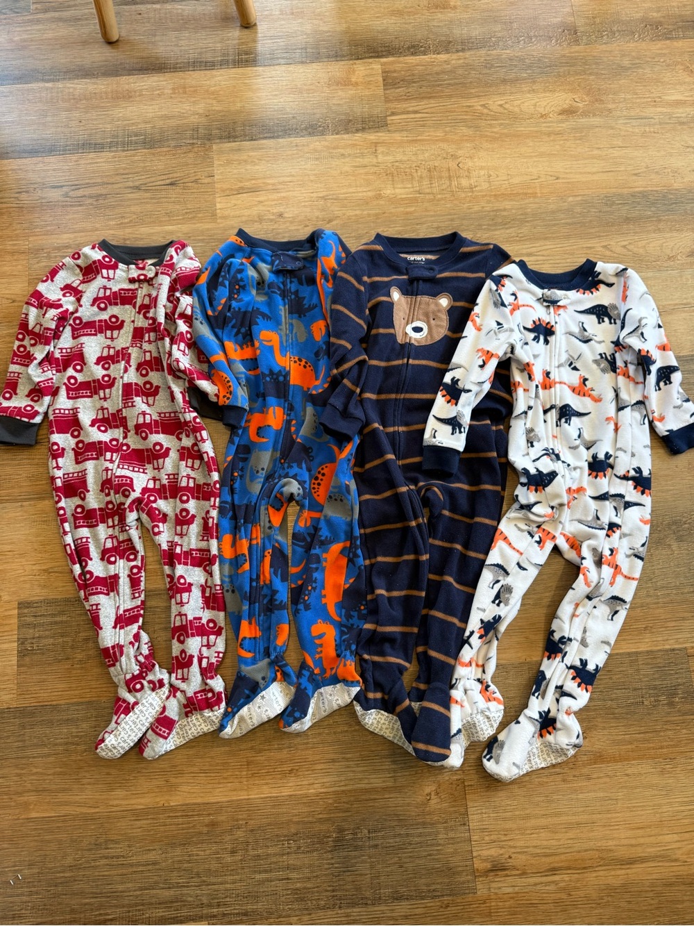 4 Pairs of Carter's Boys Mixed Print Footed Front Zip Pajamas Sizes 24 months/2T